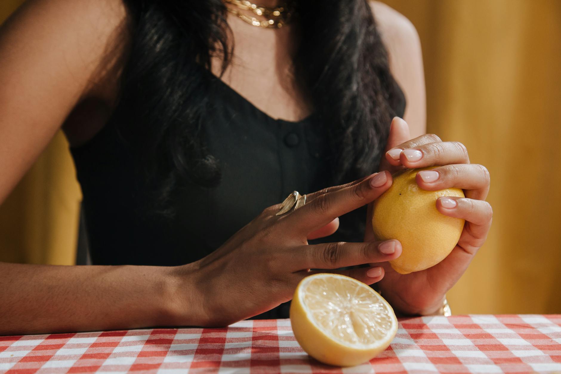 Close-up of hands holding a personal massager, showing comfort and ease during solo pleasure
